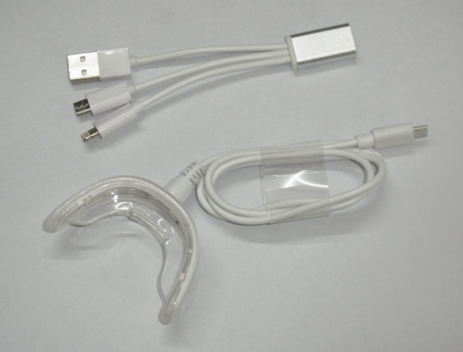 LED Cold Light Teeth Whitening Device - Many features including phone imput plug