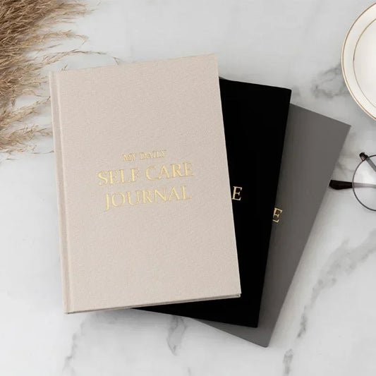 Self-care Journal (A self-care journal helps you slow down, reflect, and reconnect with yourself. Perfect for tracking thoughts, setting intentions, and building healthy habits for a calmer, more balanced mind)
