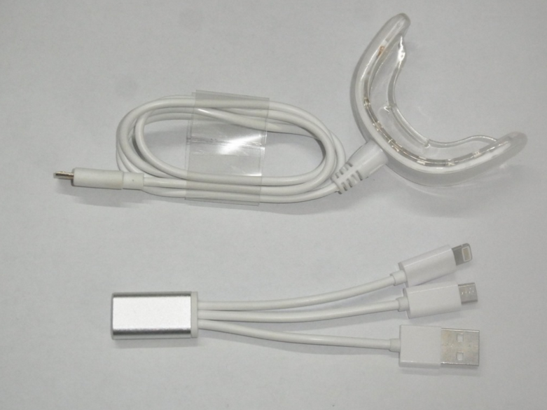 LED Cold Light Teeth Whitening Device - Many features including phone imput plug