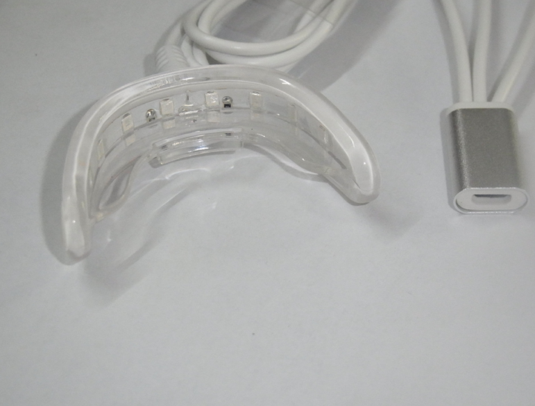 LED Cold Light Teeth Whitening Device - Many features including phone imput plug